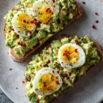 Smashed Avocado Toast with Egg and Red Pepper Flakes First Image